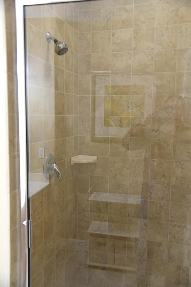 bathroom featuring walk in shower