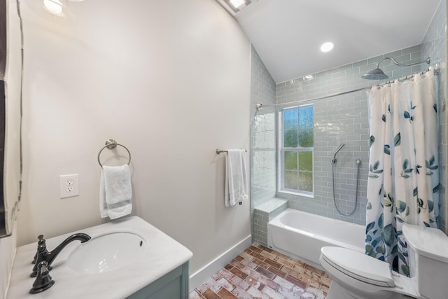 full bathroom with toilet, vanity, and shower / tub combo with curtain