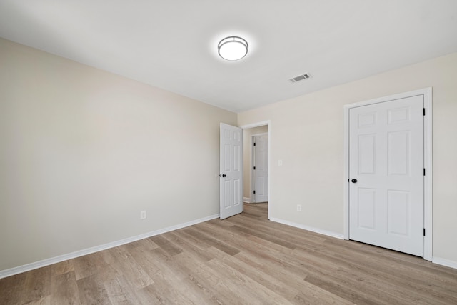 unfurnished bedroom with light hardwood / wood-style flooring