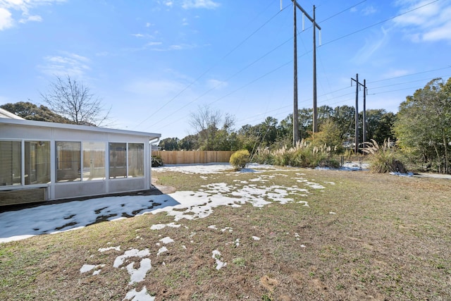 view of yard with a sunroom