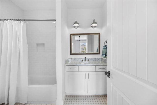 bathroom featuring vanity and shower / tub combo