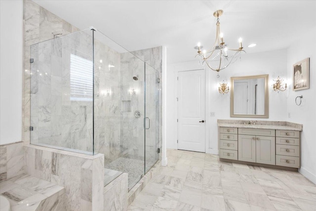 bathroom with vanity, a chandelier, and walk in shower