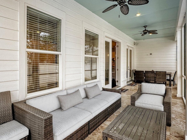 exterior space with outdoor lounge area and ceiling fan