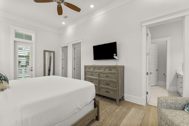 bedroom featuring ensuite bath, light hardwood / wood-style floors, access to exterior, ceiling fan, and crown molding