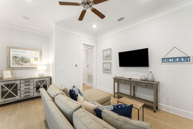 living room with ceiling fan, light wood-type flooring, and ornamental molding