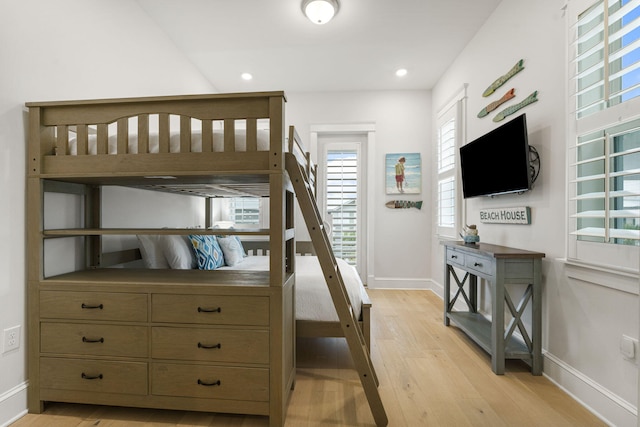 bedroom with light wood-type flooring