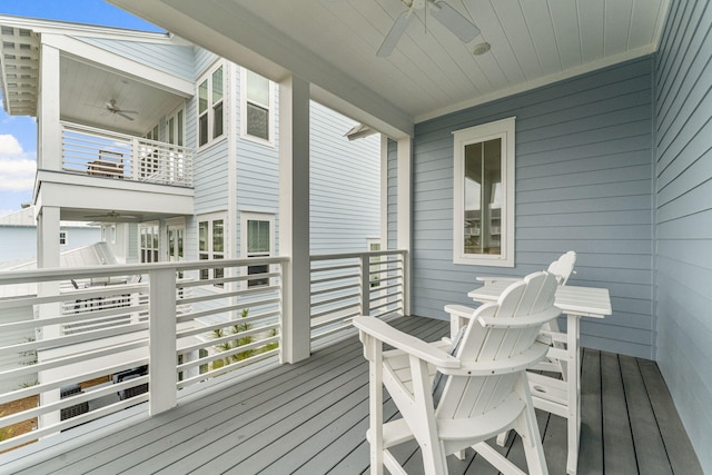 wooden terrace with ceiling fan