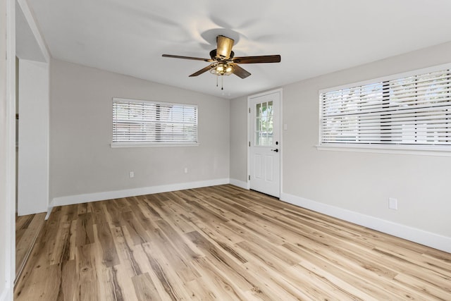 foyer featuring light hardwood / wood-style floors and ceiling fan