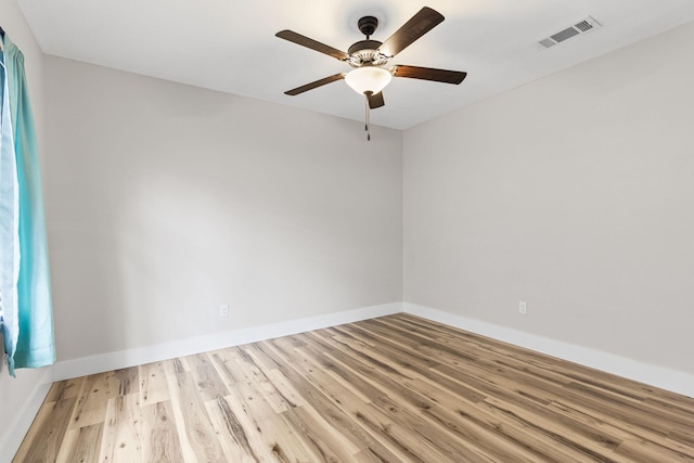 unfurnished room featuring light hardwood / wood-style flooring and ceiling fan