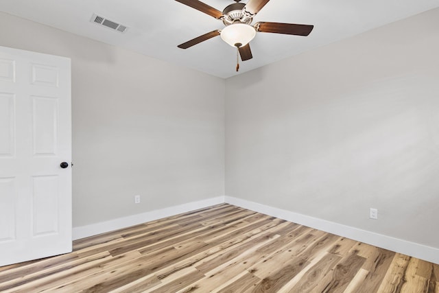 unfurnished room featuring ceiling fan and light wood-type flooring