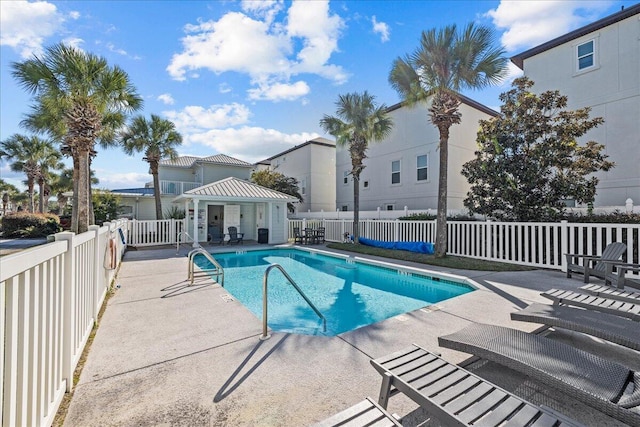 view of pool with a patio area and a gazebo