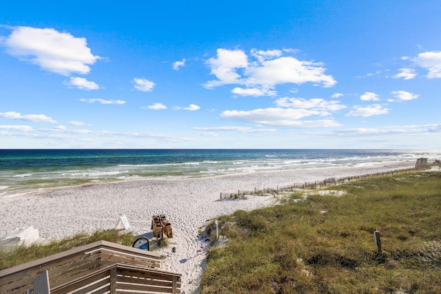 property view of water featuring a beach view