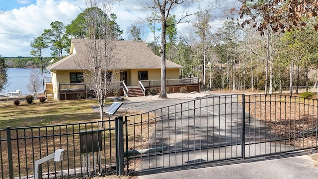 view of gate with covered porch