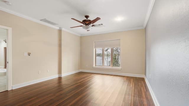 unfurnished room with ornamental molding, dark hardwood / wood-style floors, and ceiling fan