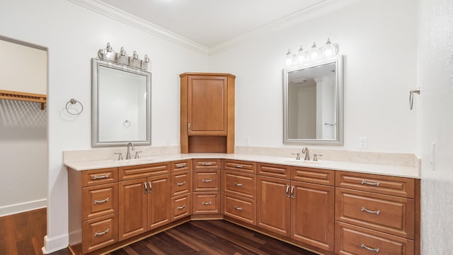 bathroom featuring vanity, hardwood / wood-style floors, and crown molding