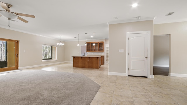 unfurnished living room with ceiling fan with notable chandelier, ornamental molding, and sink