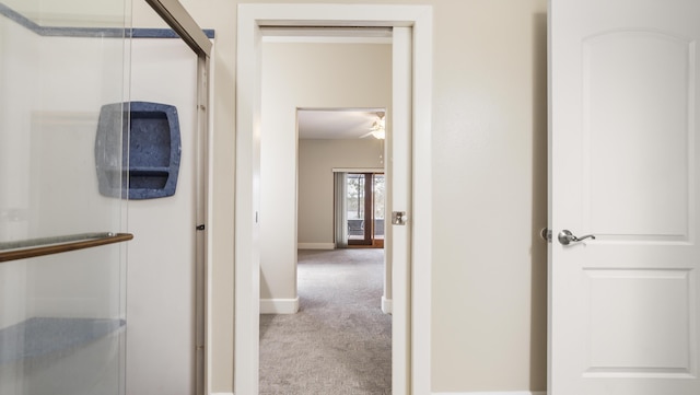 corridor featuring carpet floors