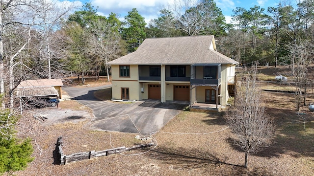 view of front of property featuring a garage