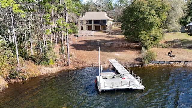 dock area with a water view