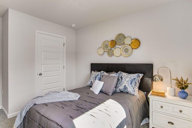 bedroom featuring carpet