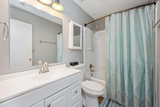 full bathroom with vanity, toilet, shower / bath combination with curtain, and a textured ceiling