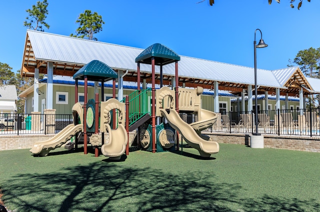 community jungle gym with fence