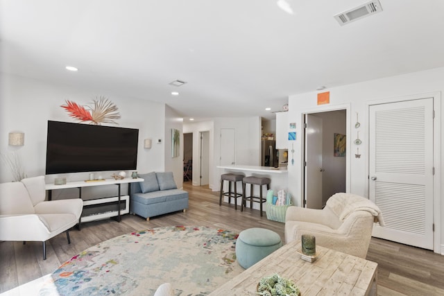 living room with hardwood / wood-style flooring