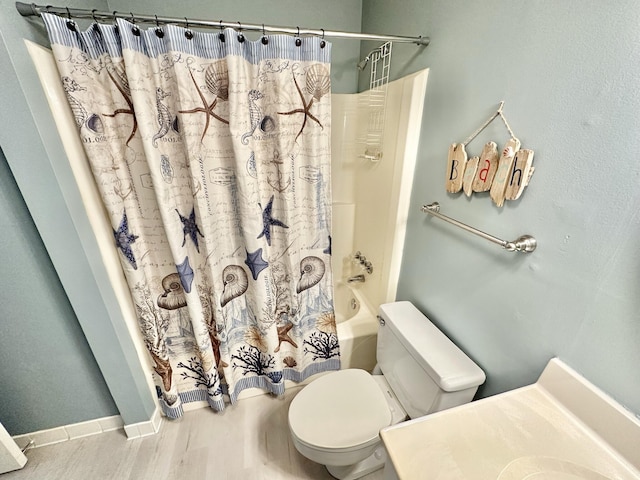 bathroom featuring toilet and shower / tub combo with curtain