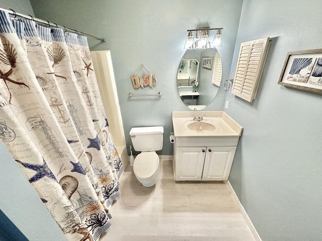 full bathroom with toilet, shower / bath combo, and vanity