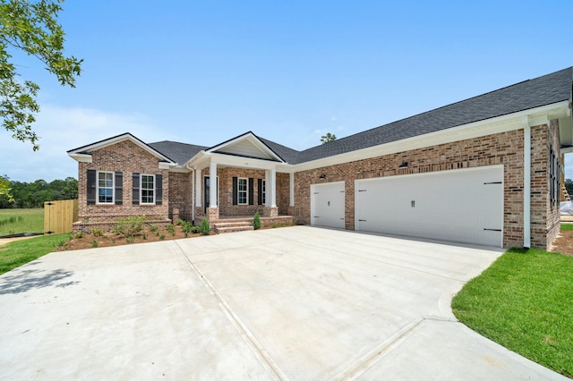 single story home with a garage