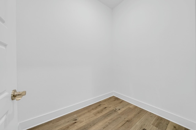 spare room featuring hardwood / wood-style floors