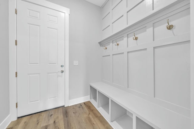 mudroom with light hardwood / wood-style floors