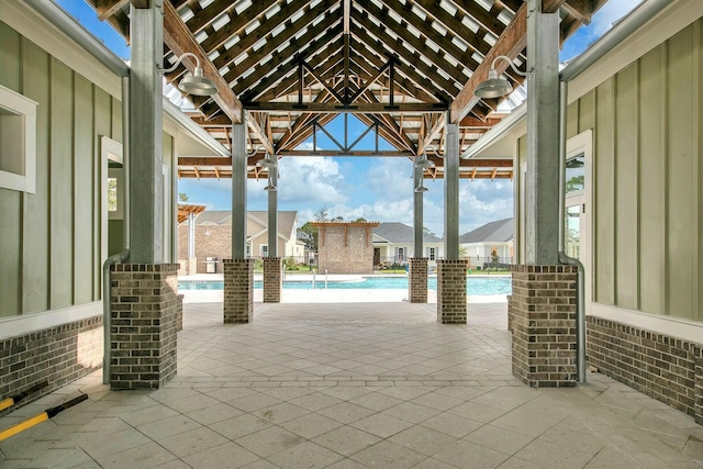 view of patio with a community pool