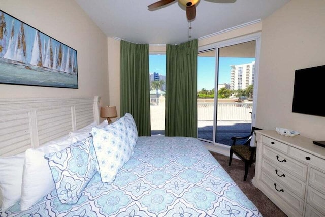 bedroom featuring ceiling fan and access to exterior