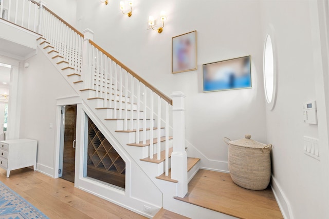 stairway featuring hardwood / wood-style floors