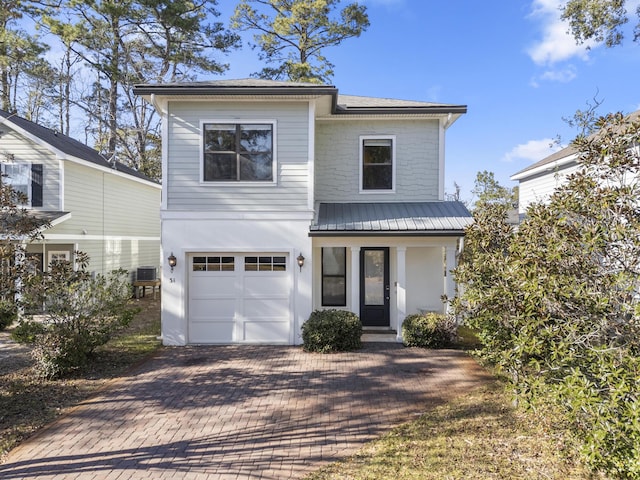 front facade with a garage