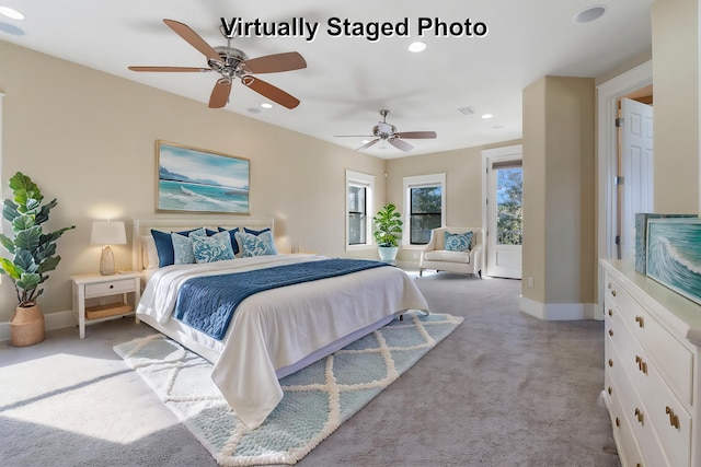 carpeted bedroom featuring ceiling fan