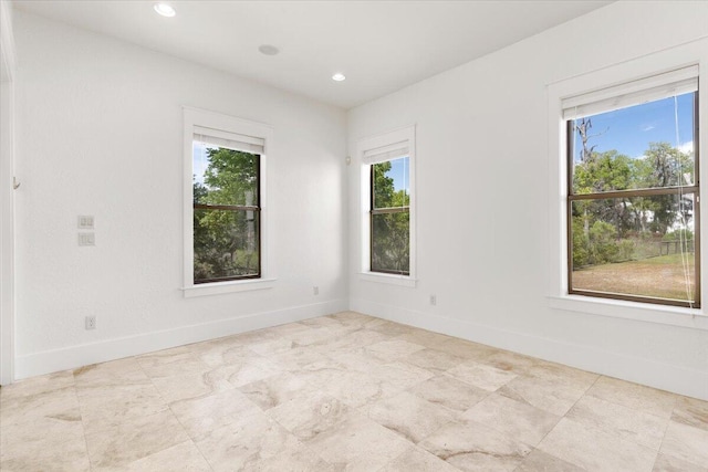 31 Beacon Point Dr, Santa Rosa Beach, FL 32459 - spare room featuring baseboards and recessed lighting