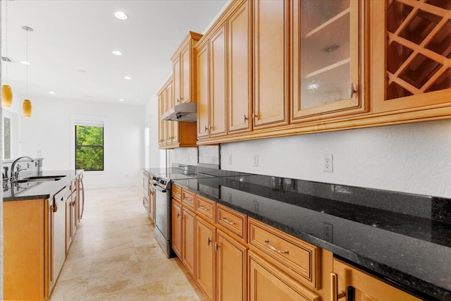 31 Beacon Point Dr, Santa Rosa Beach, FL 32459 - kitchen featuring stainless steel range with electric cooktop, dark stone counters, glass insert cabinets, under cabinet range hood, and recessed lighting