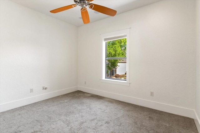 31 Beacon Point Dr, Santa Rosa Beach, FL 32459 - carpeted spare room featuring baseboards and ceiling fan