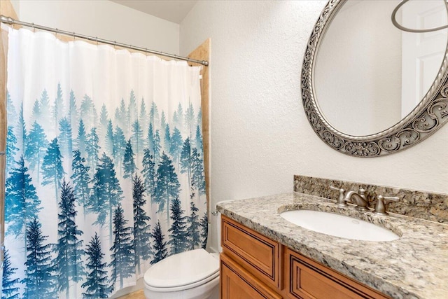 31 Beacon Point Dr, Santa Rosa Beach, FL 32459 - full bathroom featuring vanity, a textured wall, and a shower with shower curtain