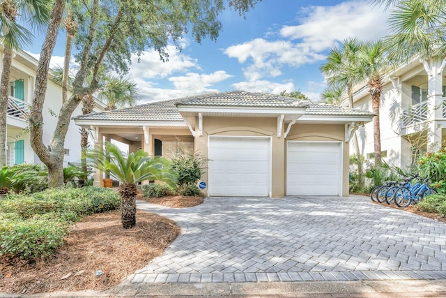 mediterranean / spanish-style house featuring a garage