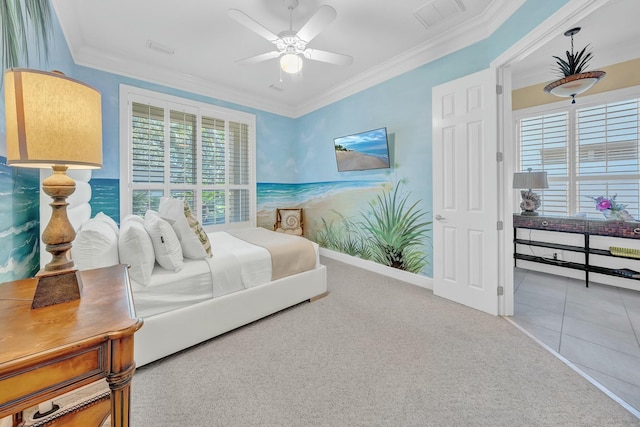 carpeted bedroom featuring crown molding and ceiling fan