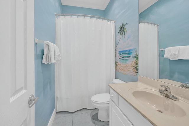 bathroom featuring tile patterned flooring, vanity, and toilet