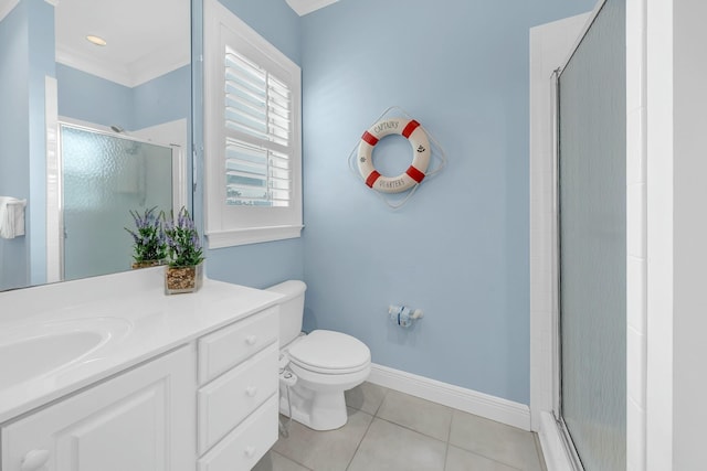 bathroom with an enclosed shower, vanity, tile patterned floors, and toilet