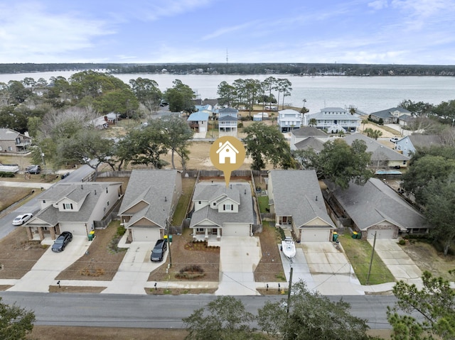 bird's eye view with a water view