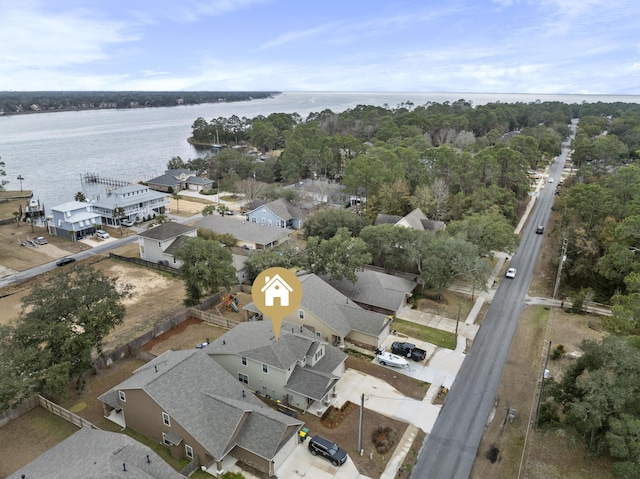 birds eye view of property featuring a water view