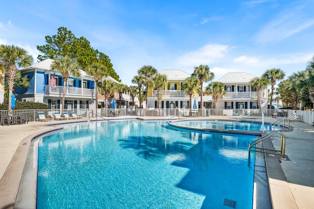 view of swimming pool with a patio area