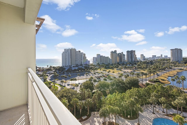 balcony featuring a water view