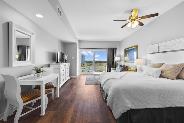 bedroom with dark wood-type flooring, ceiling fan, and access to outside